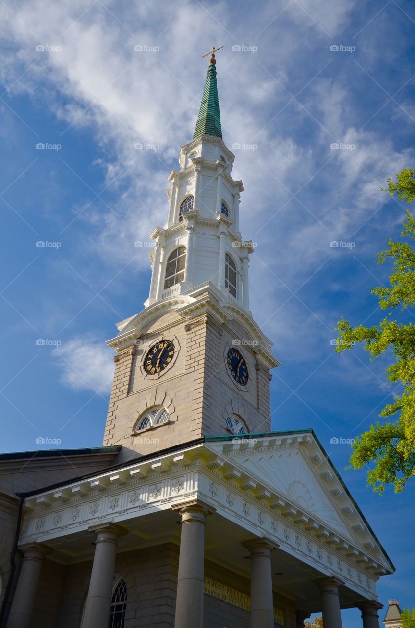 Low angle view of church against cloudy sky