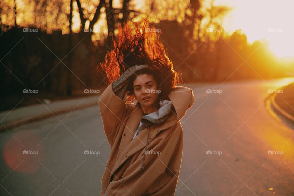 Portrait of woman standing on street