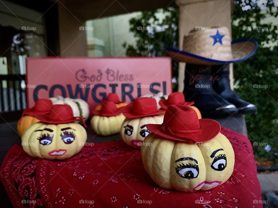 Pumpkins dressed as cowgirls 