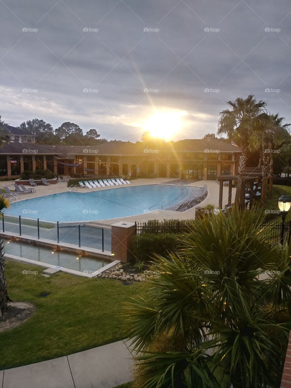 sunset over the pool