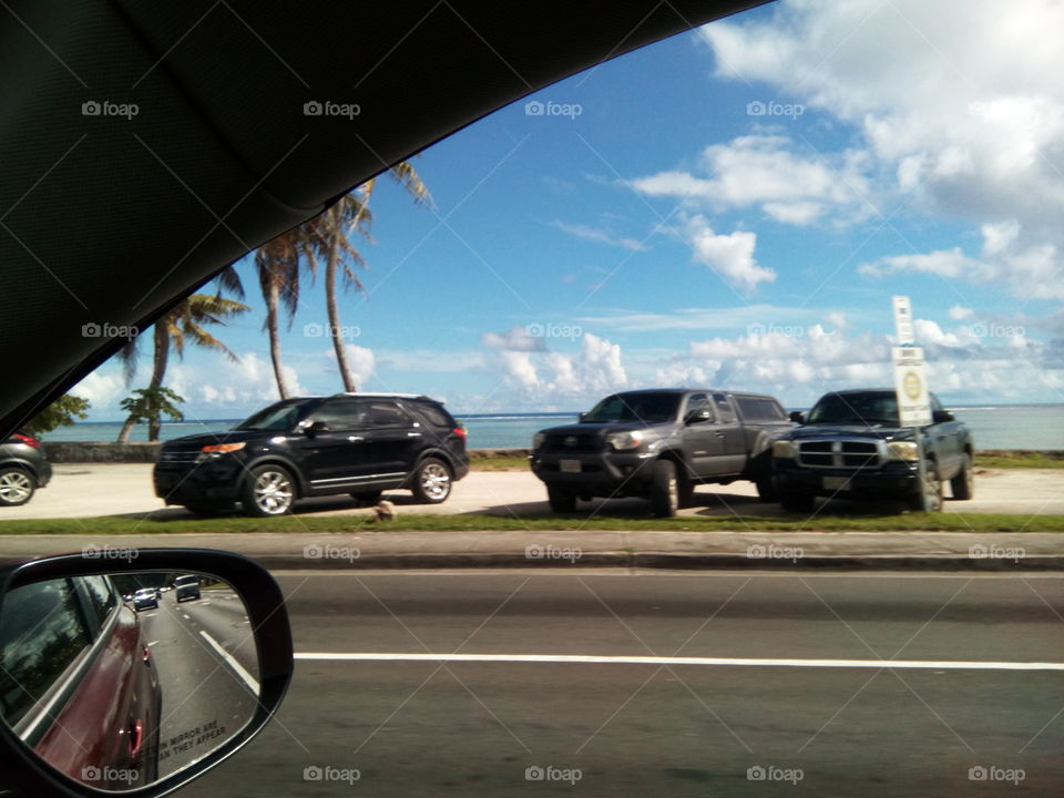 blue skies and cars