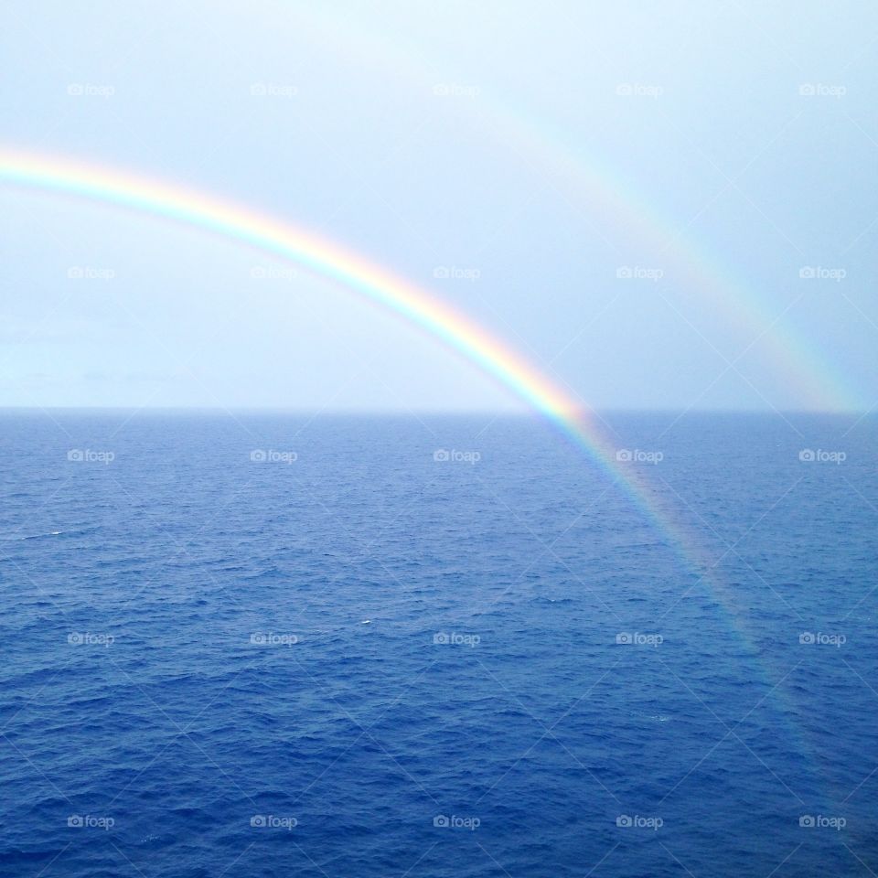 Colorful rainbow and sea