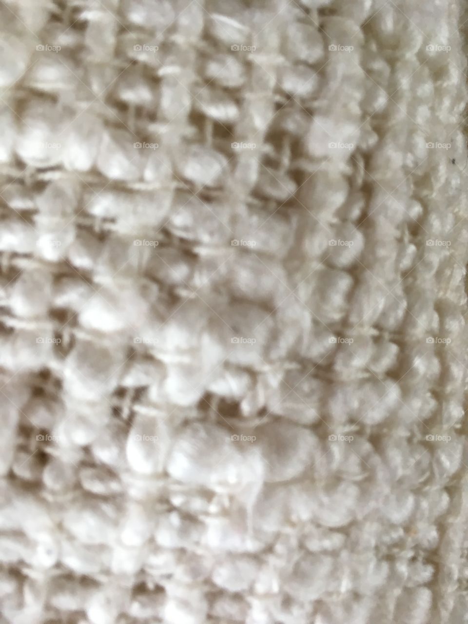 White textured baby blanket close up 