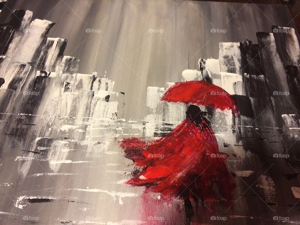A hauntingly beautiful painting of a lady in red walking through the empty streets. 