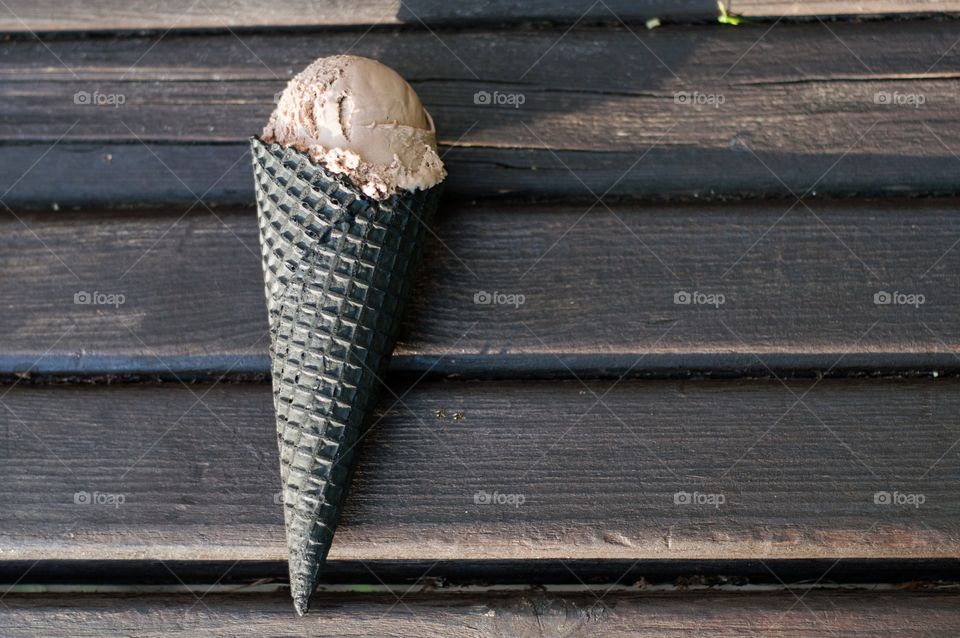 Chocolate ice cream on wood