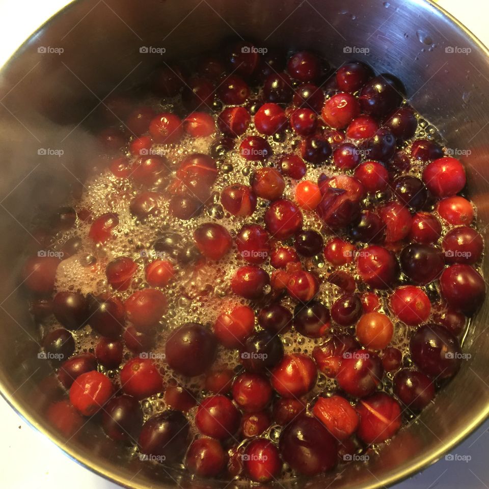 Cooking cranberries. 