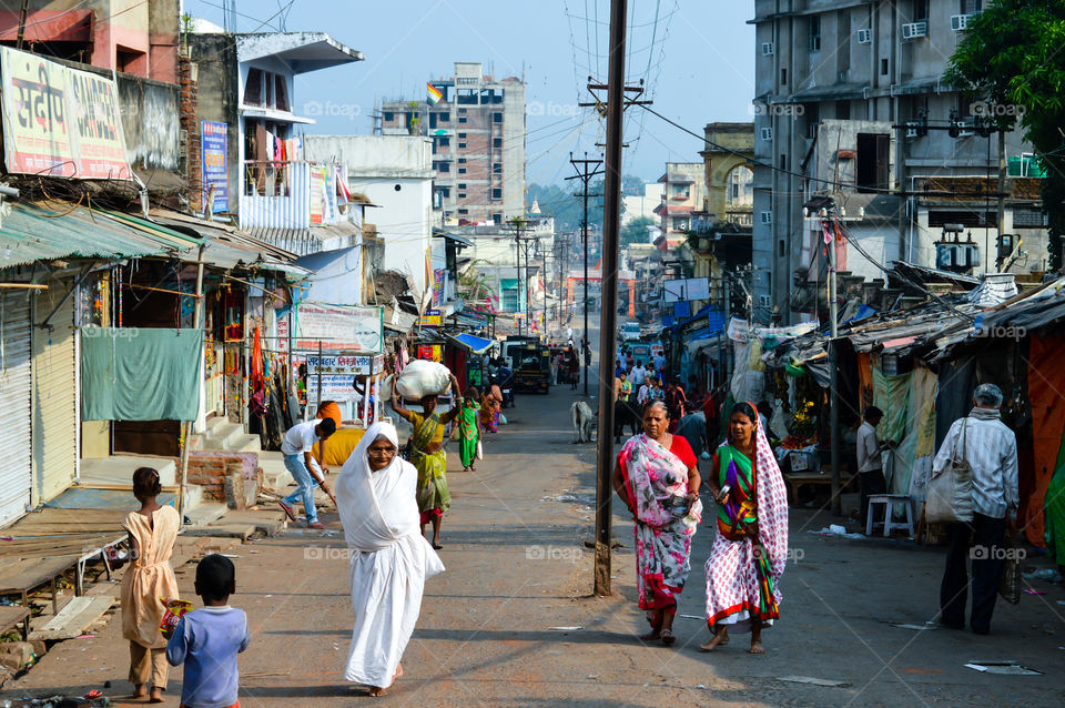 PARESHNATH, JHARKHAND, INDIA - JAN 25: People and crowds walking through the famous weekend market area. It was believed to be a popular Maoist area earlier.