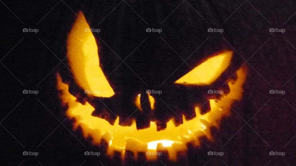 Jack-o'-lantern. Scary pumpkin carving for Halloween