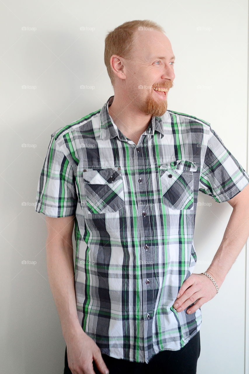 Man with beard in a shirt