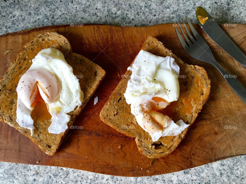 High angle view of poached eggs on Toast