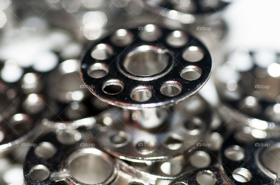 Close-Up of Metal Bobbins