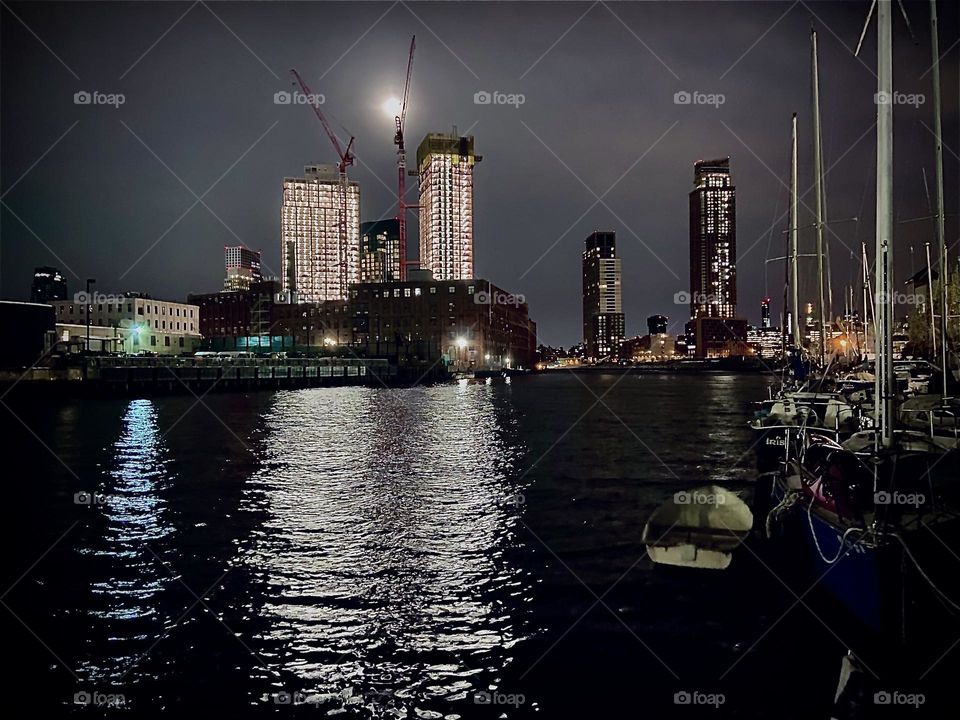 The “LIC” and the “Manhattan” skyline can be seen from here at the perfect vantage point at “Newtown Creek” in Queens, NY. The time was 3:30 AM and not a soul was around other than the photographer who lives on a boat here. 2022. Hypnotic Productions