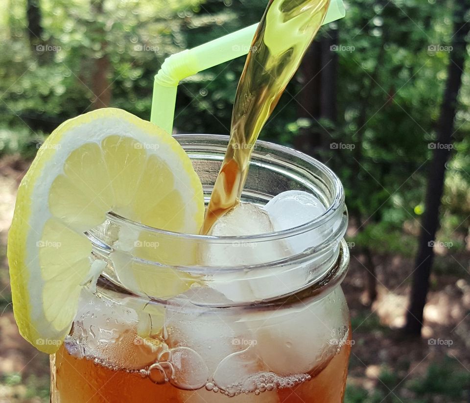 Pouring iced tea