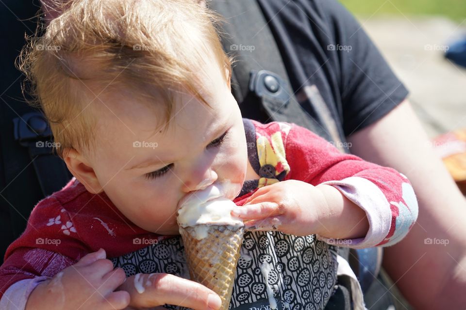 Baby Girl Eating Vanilla Ice Cream