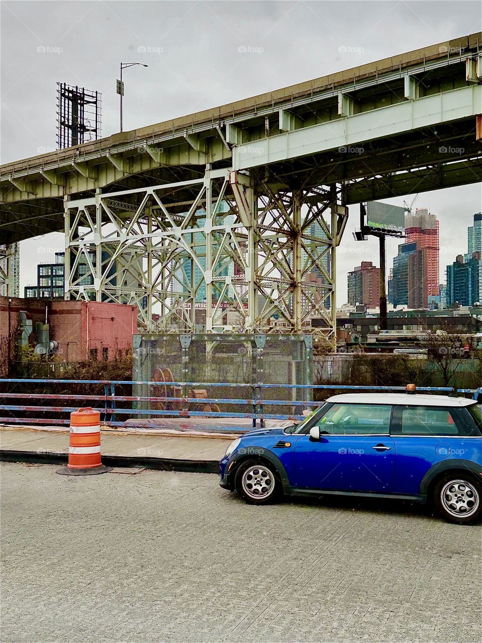 This is “Borden Avenue” and the “Borden Avenue Bridge” over “Dutch Kills” in front of the unmistakably recognizable support structure of the “Brooklyn Queens Expressway”. 2023. Hypnotic Productions