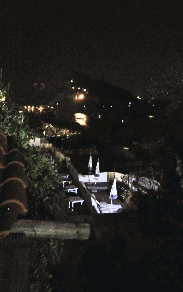 Aragonese Castle by night seen from a hotel on the Italian island of Ischia