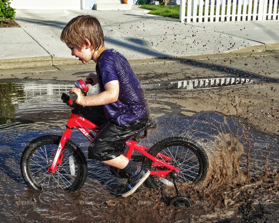 Young boy getting dirty