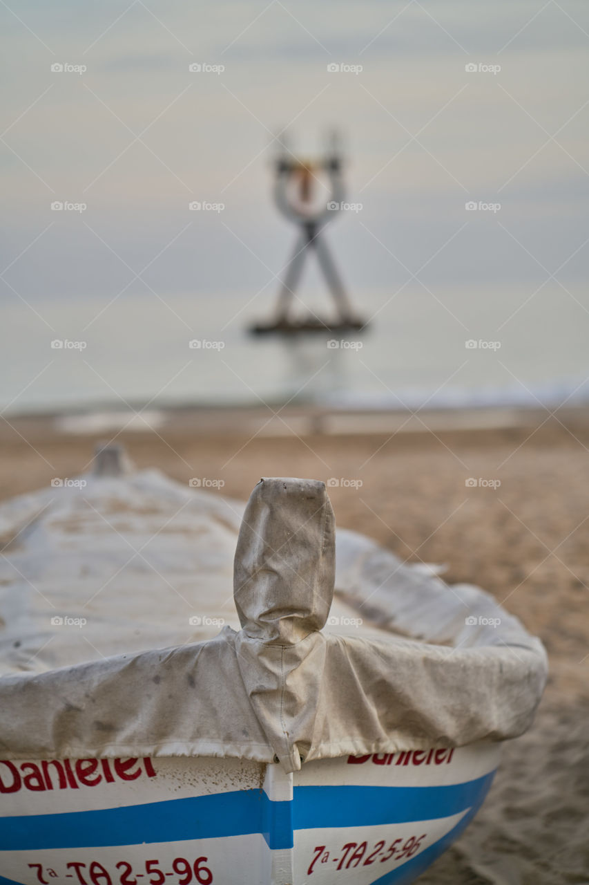 Boat at the beach in a winter day