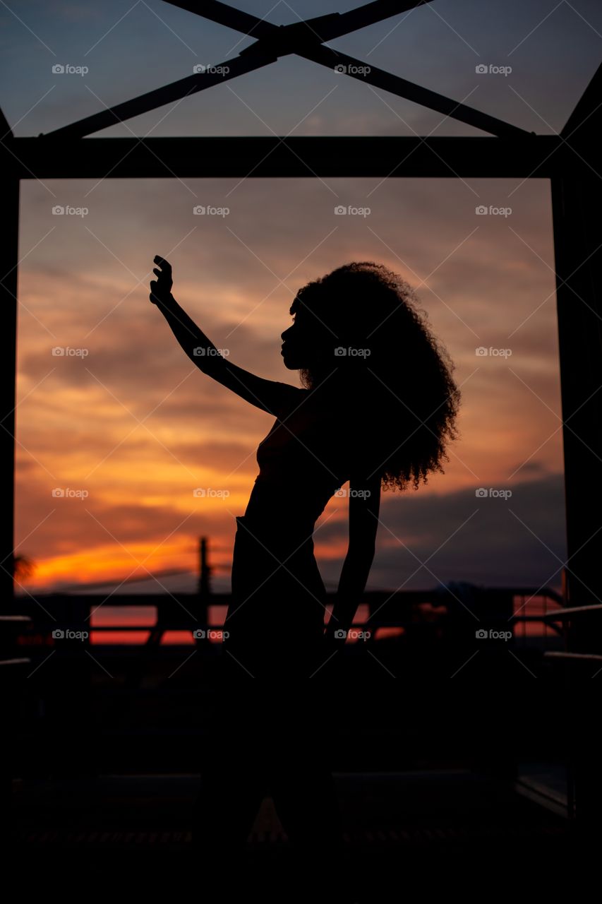 girl watching the sunset