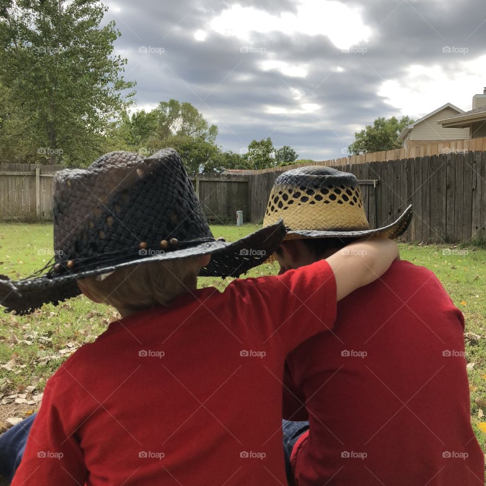 Boys with their hats(little cowboys)