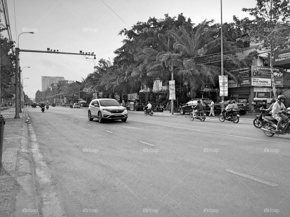 Black and white road in Bien Hoa city, Vietnam, in the evening
