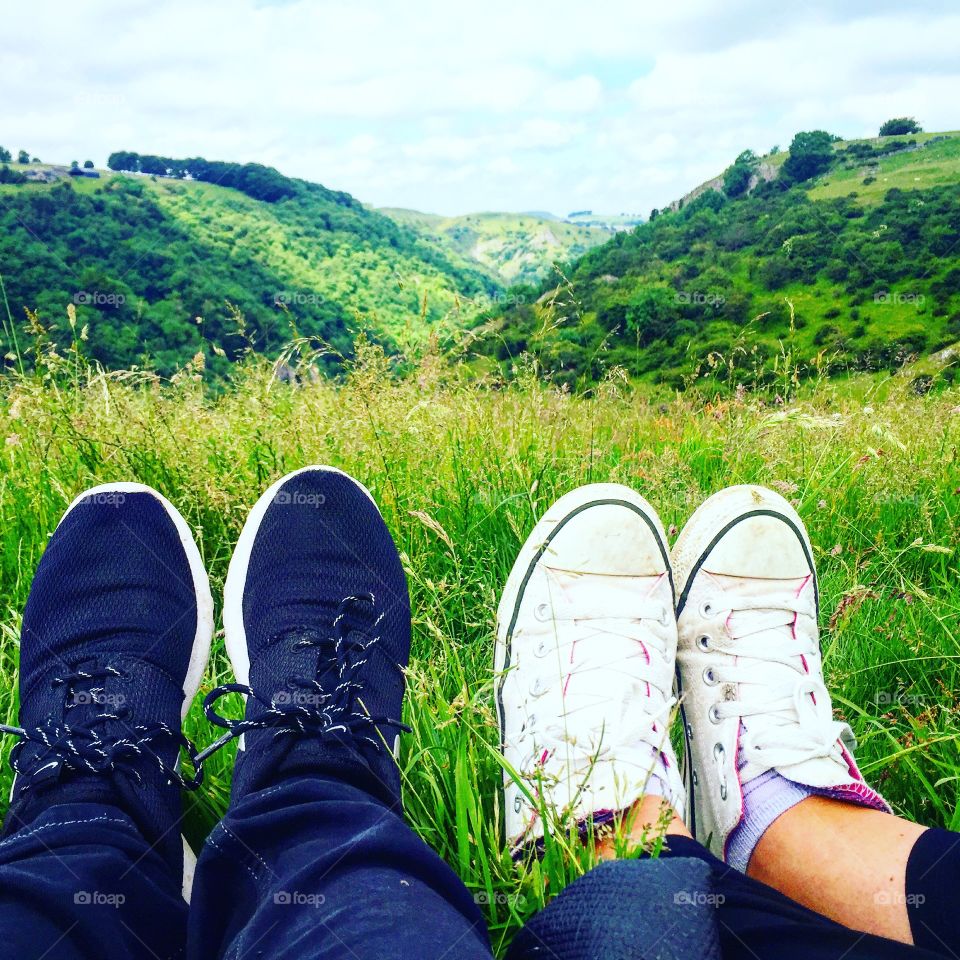 Human foots on the grass