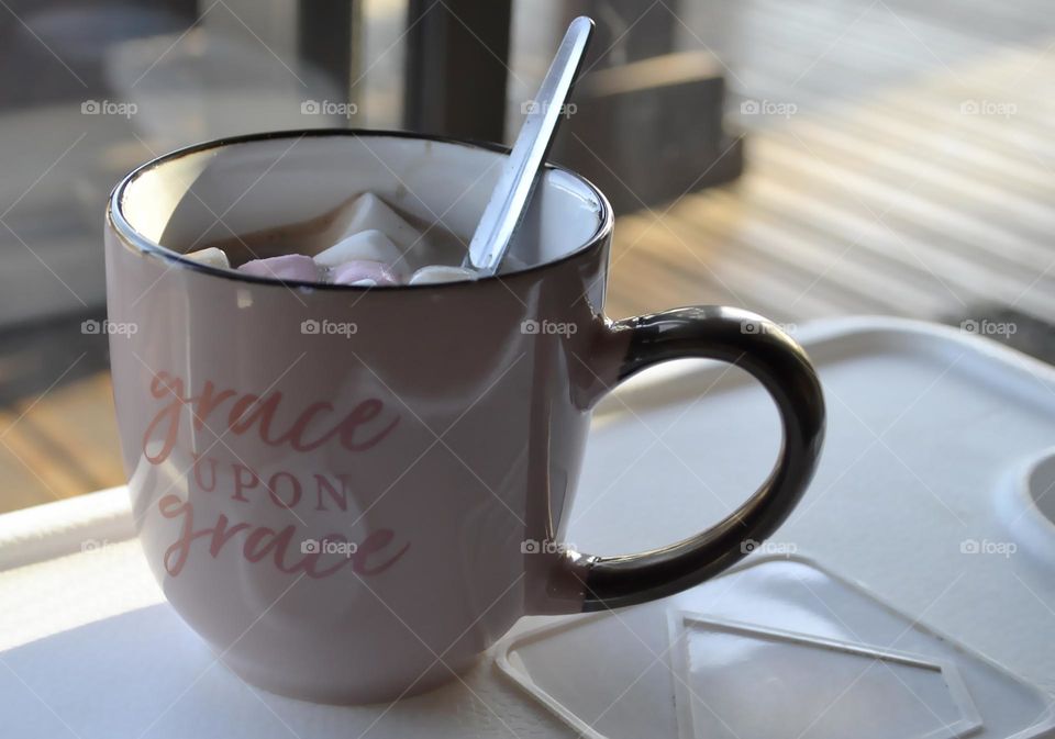 Good morning pink mug coffee with marshmallows