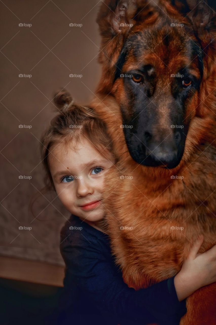 Little girl and German shepherd  portrait 