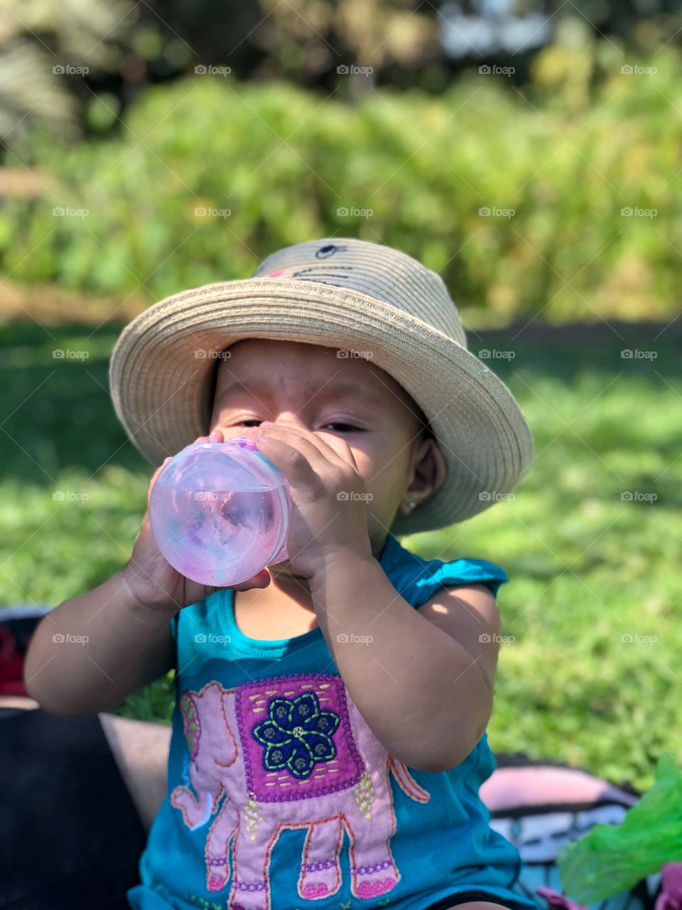 Baby girl drinking water