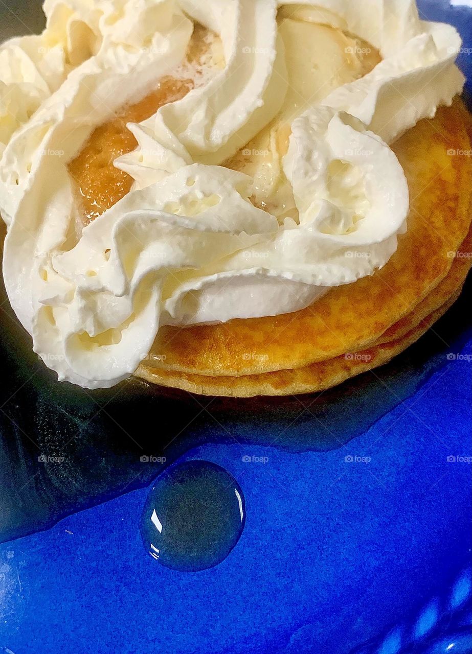 Pancakes and whipped cream 