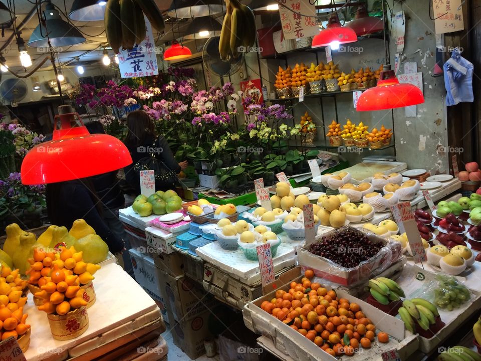 Fruit and flowers . Street stall and shop in Hong Kong 