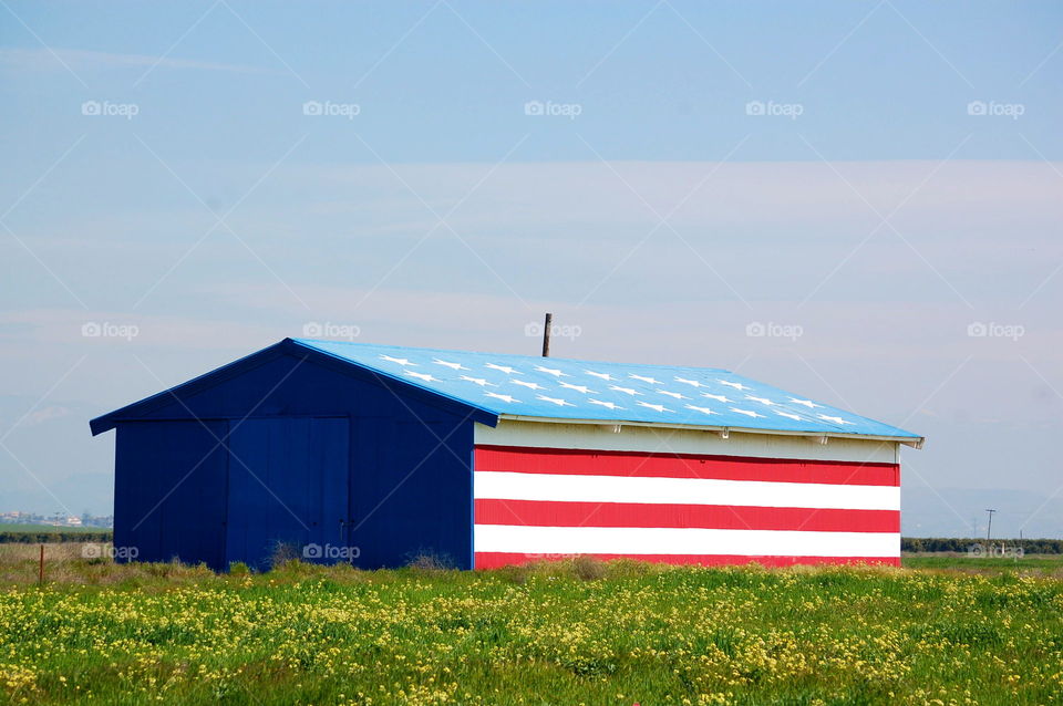 flag and barn