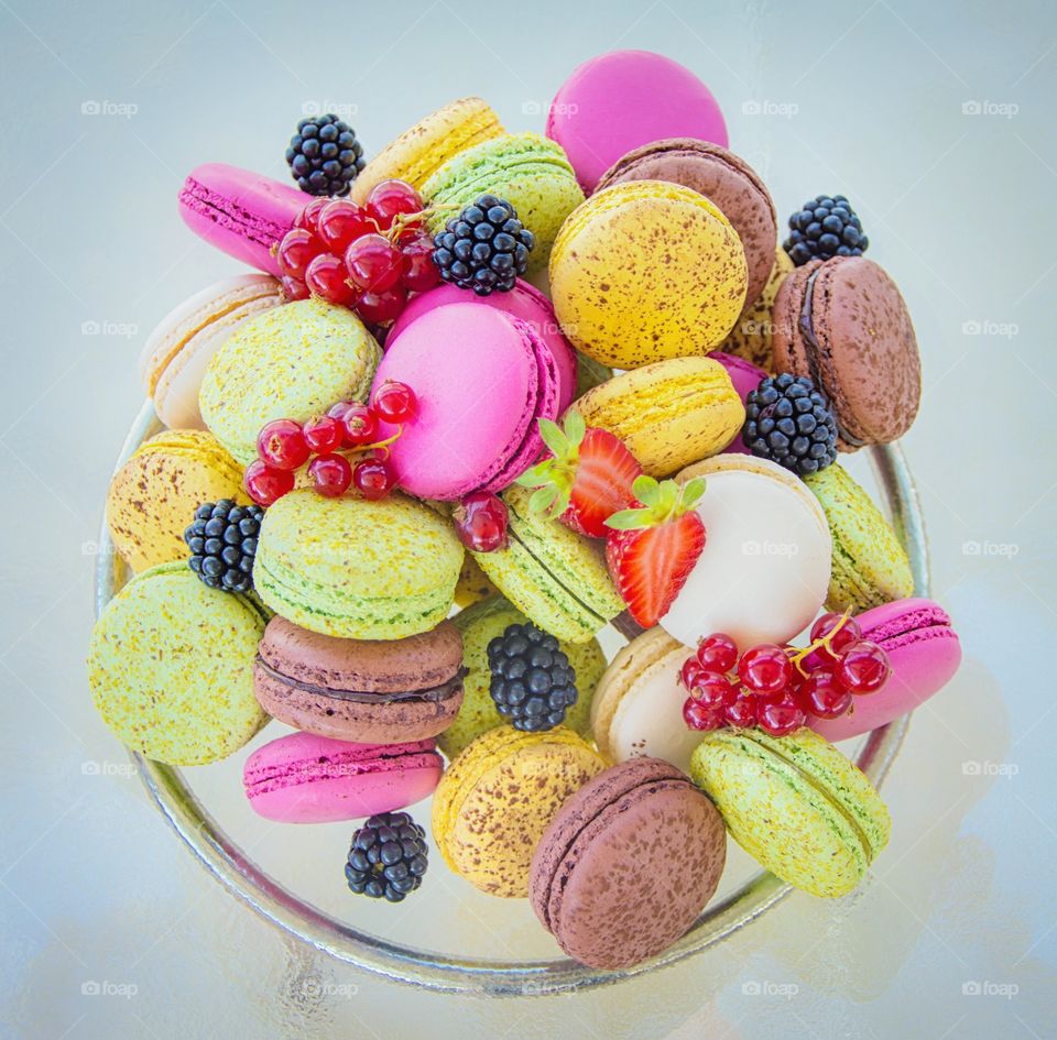 colorful macarons and fruits