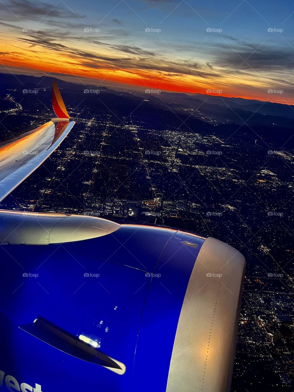 Beautiful sunset flying over Los Angeles California on a Southwest Airlines Boeing 737 after taking off from Hollywood Burbank Airport (BUR)