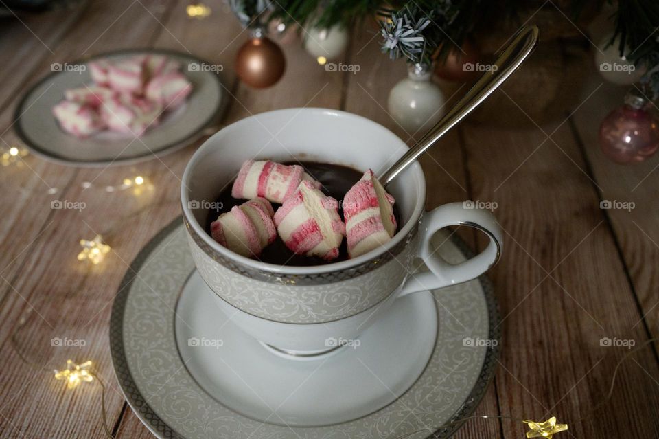 a cup of hot chocolate with marshmallows