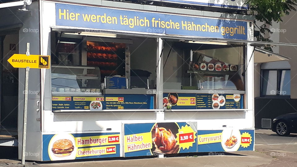 german shop selling Chicken and French fries