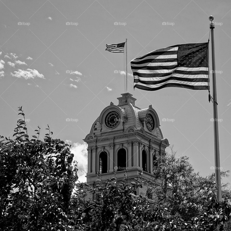 American flag over government building