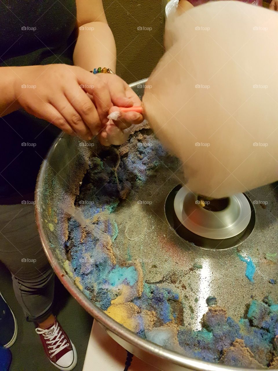 Hand making cotton candy