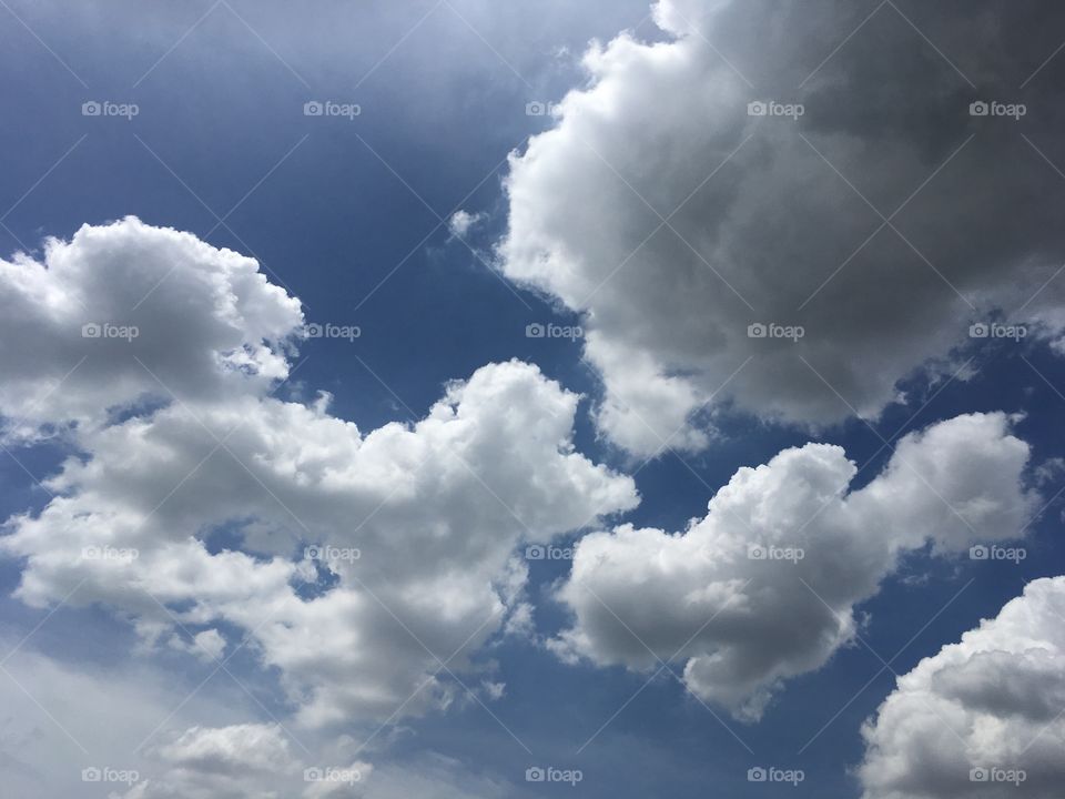 Blue sky with art of clouds 