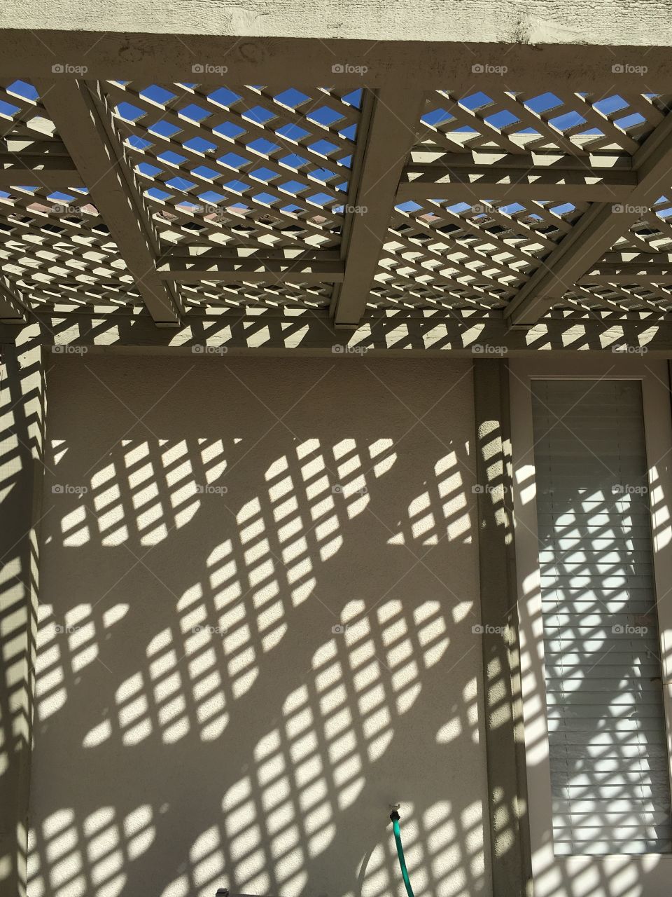 Lattice shadows patio