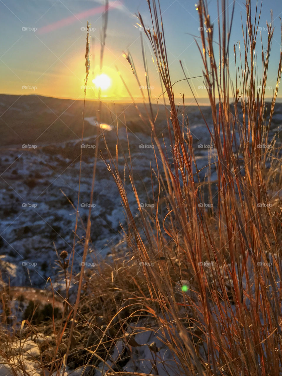 A frigid December 31st spent hiking in the North Dakota badlands at Theodore Roosevelt National Park. The day was super clear and the sunset overlooking the frozen landscape was breathtaking.