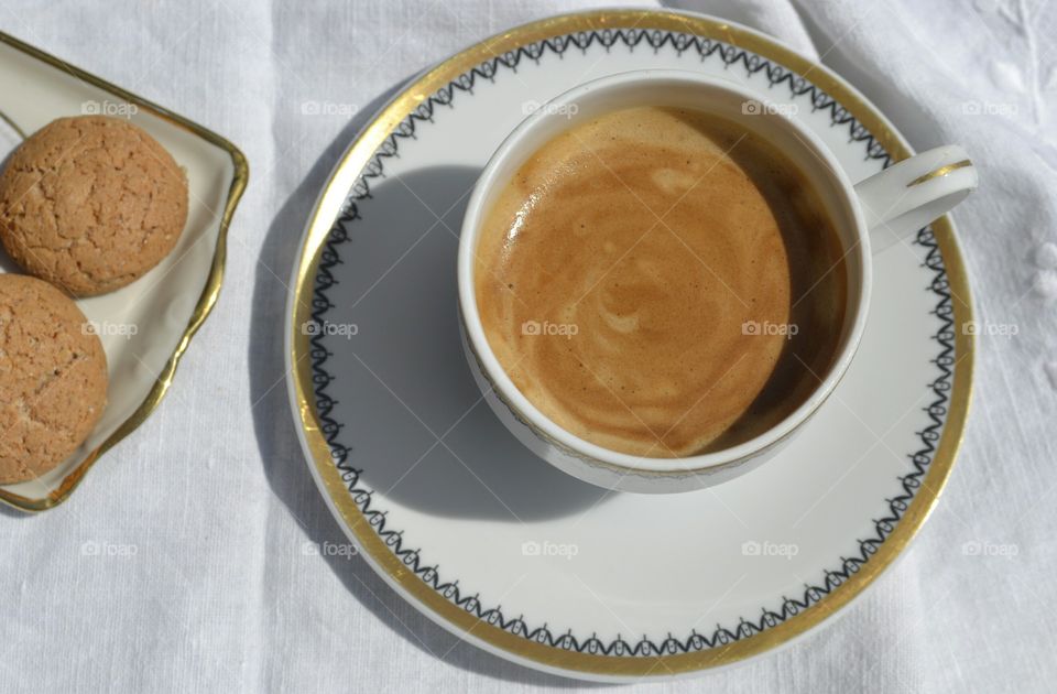 High angle view of coffee cup and saucer