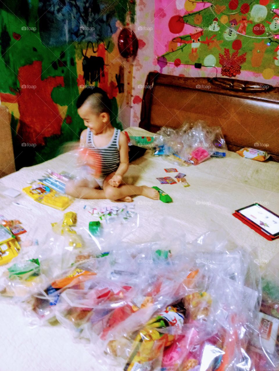 Gifts 4 christmas.
Every day is Christmas as long as you are happy and make someone happy.
Anyone can be a Santa Claus everytime you share your blessings  with others.
just like this little angel.
his so happy and excited to be a little Santa Clause