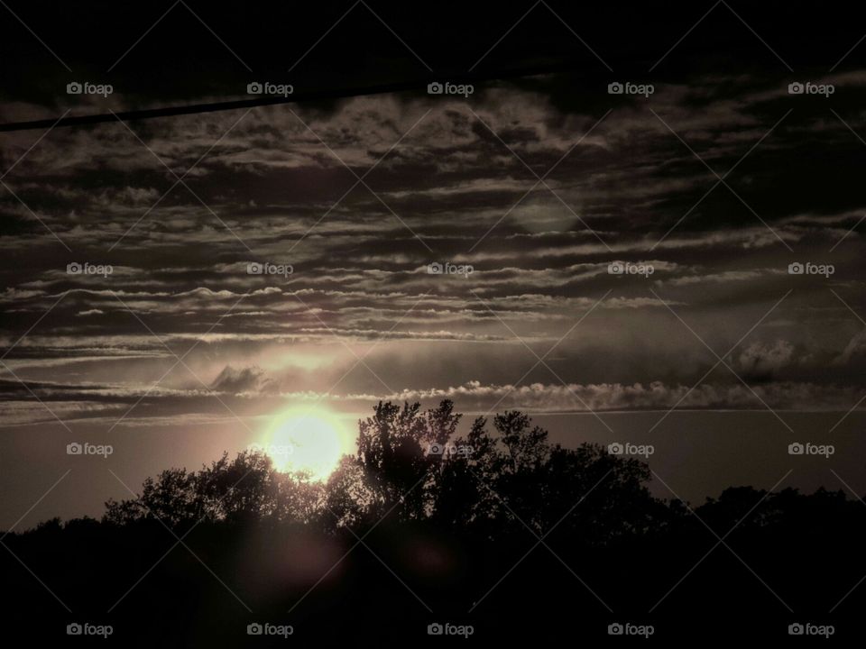 Looks kind of icy,mysterious, and a finality of the day.