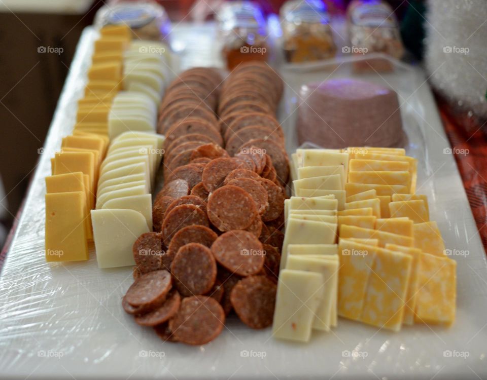 Delicious looking Charcuterie board with a variety of meats and cheeses 