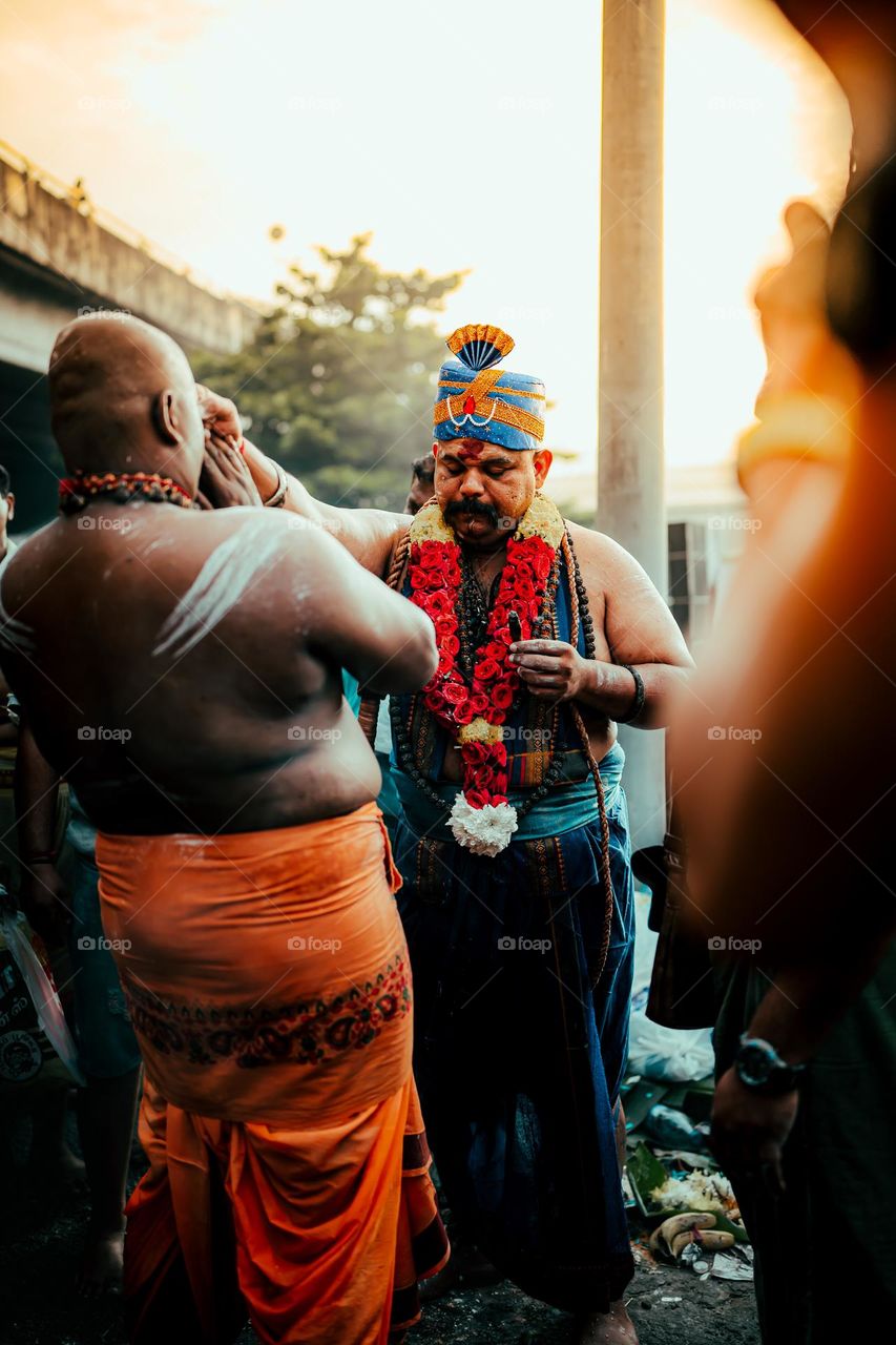 Two men in a festival ceremony
