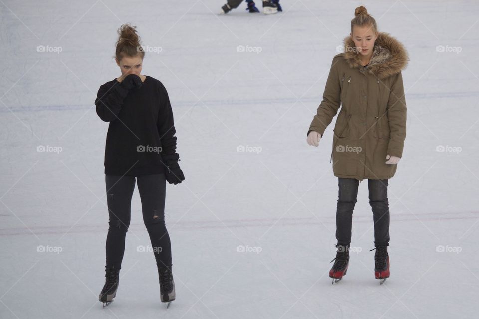 Girls On Ice Rink
