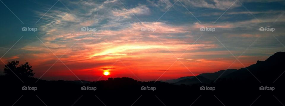 Sunset in red clouds