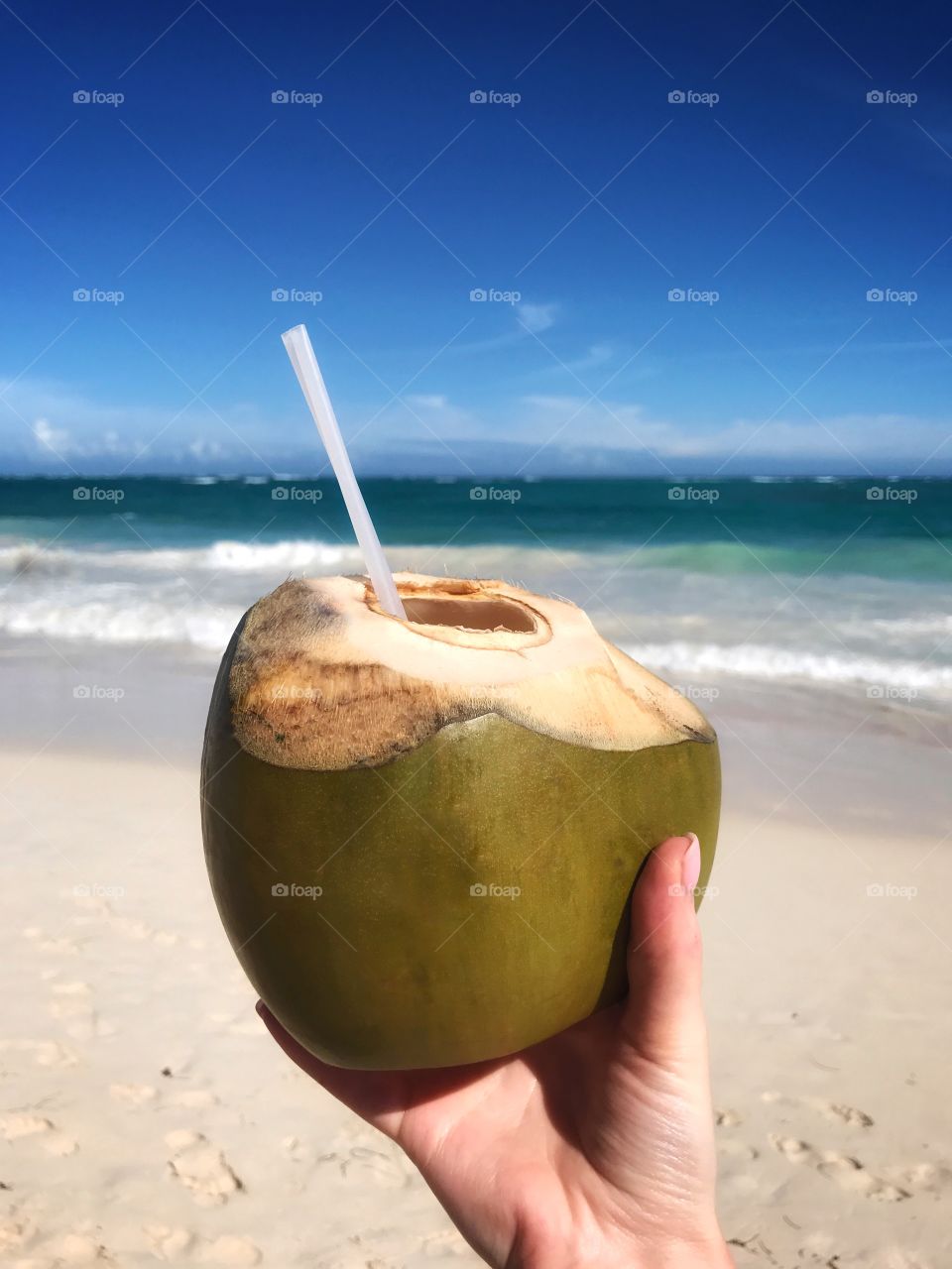 Coconut cocktail in hand