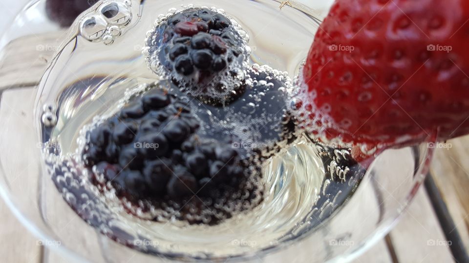 Champagne bubbles and fruit